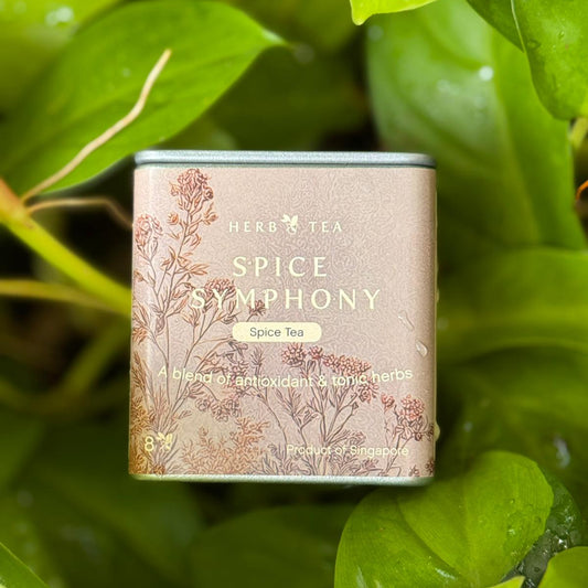 Spice Symphony canister on a leafy green background